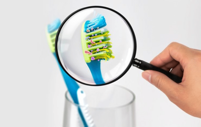 dirty toothbrush microbes bacteria