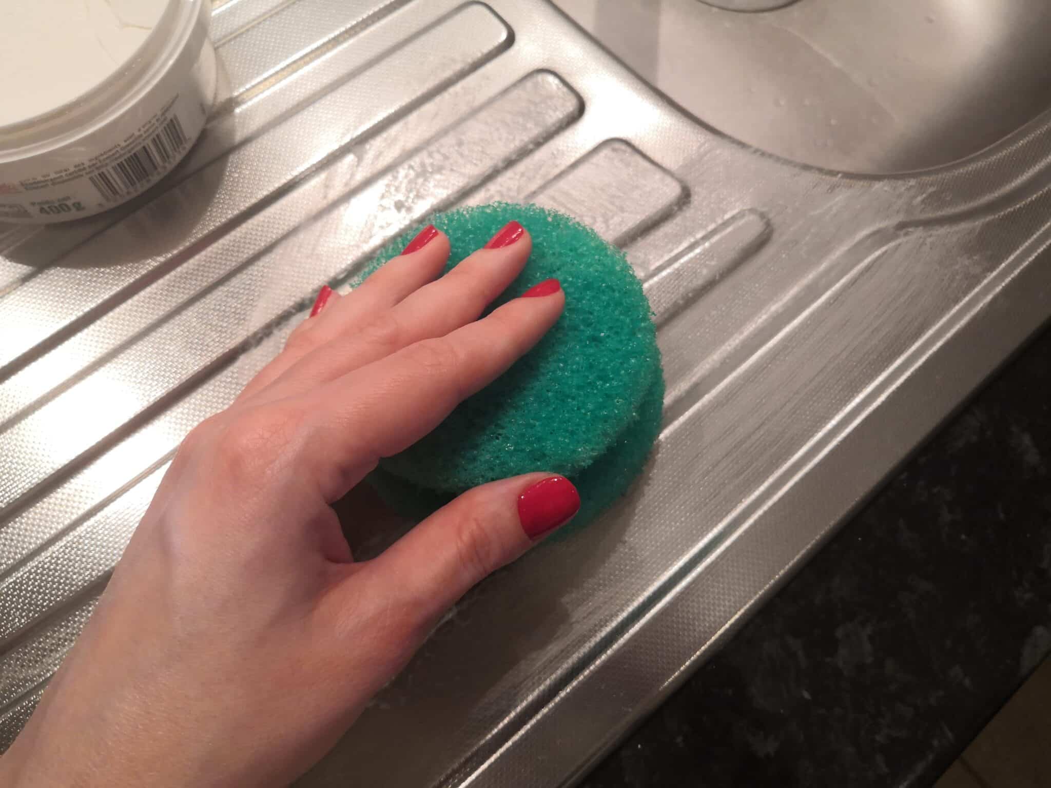 clay stone against limescale and grease on a stainless steel sink clean and shine stainless steel