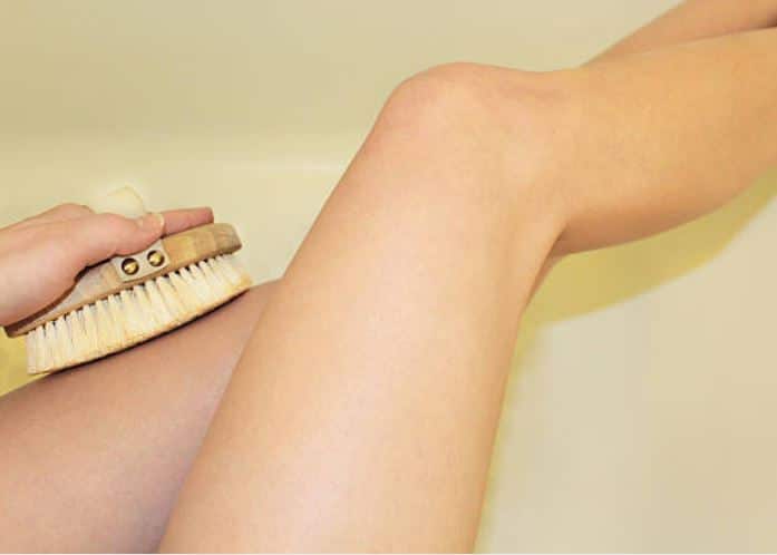 legs dry brushing exfoliation