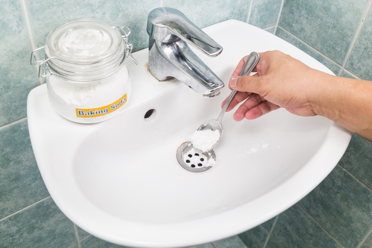 baking soda in sink drain to unclog deodorize clean pipes piping