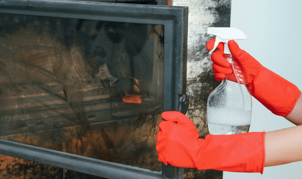 cleaning a fireplace or wood stove window