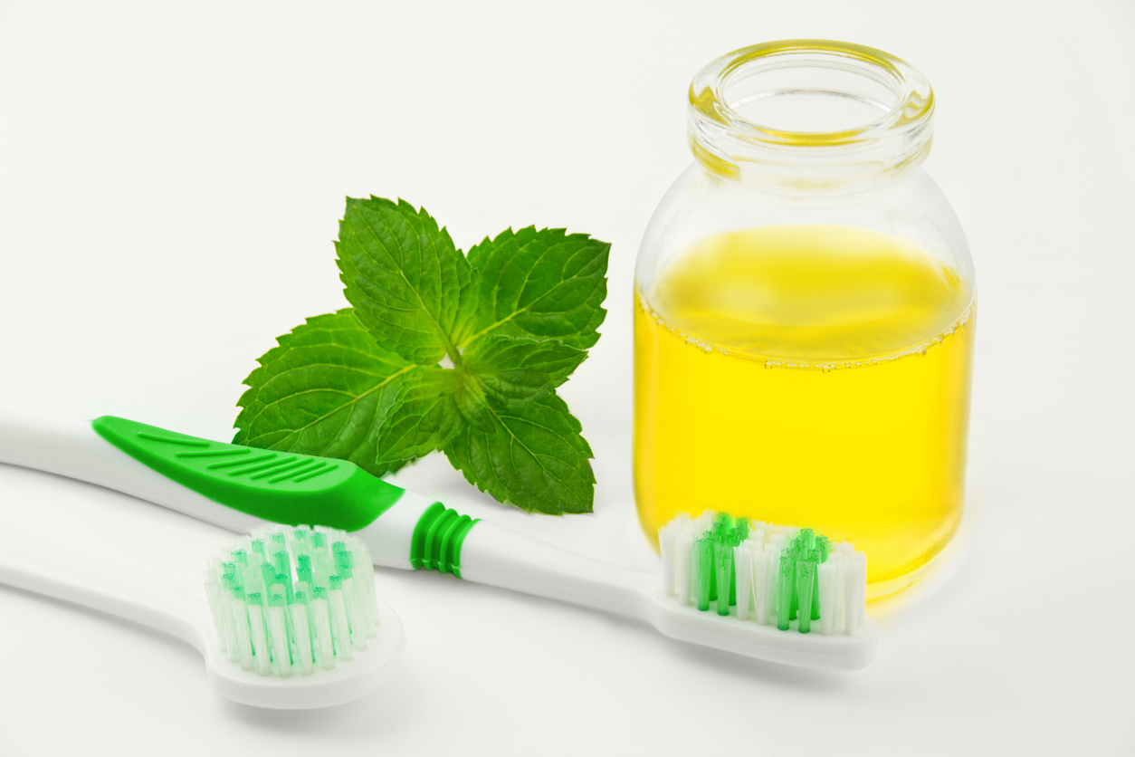 oil pulling mouthwash with coconut or sesame oil