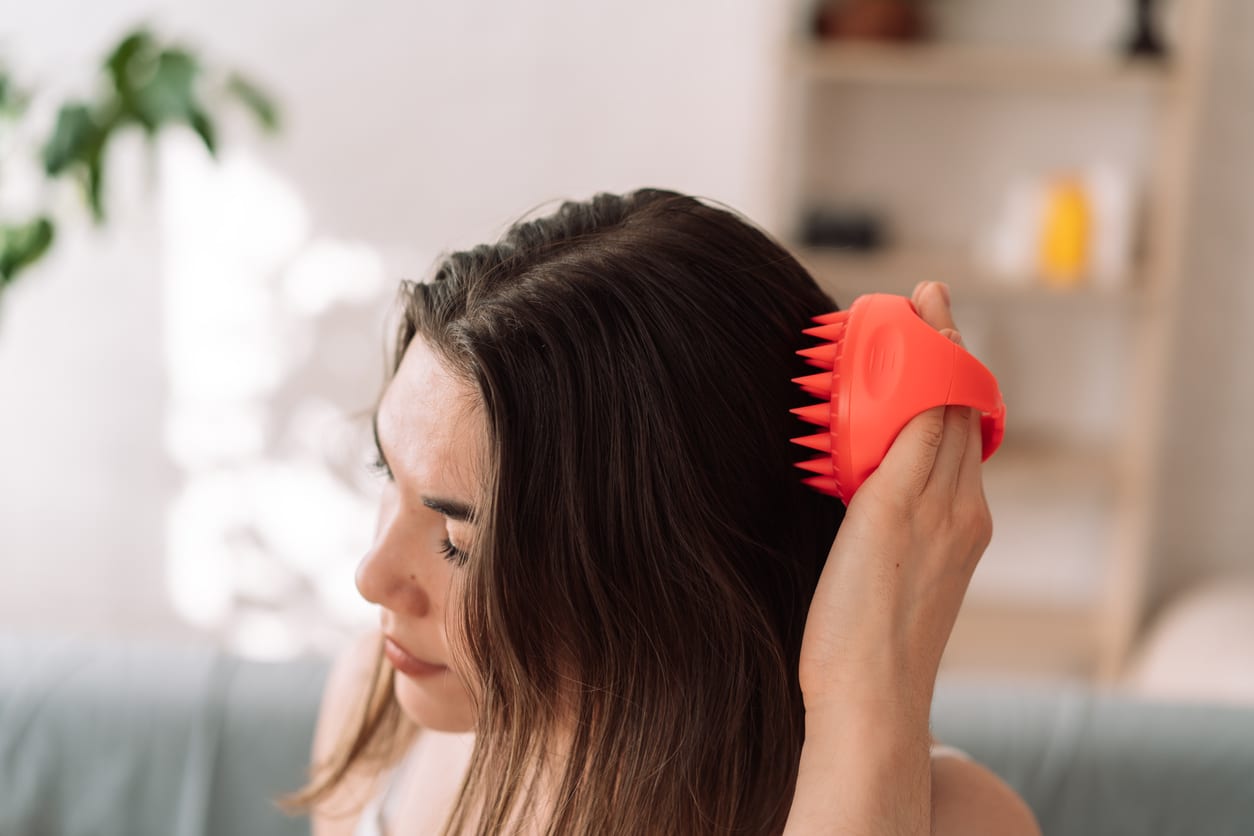 head massage using scalp massager to make hair grow faster