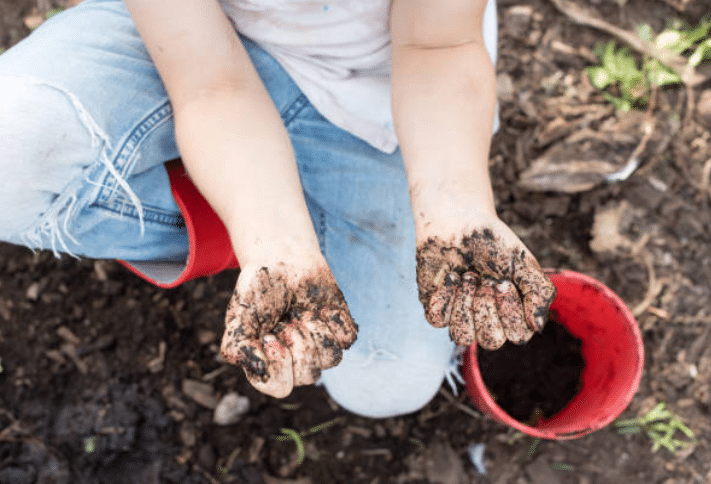 earth dirty hands mud