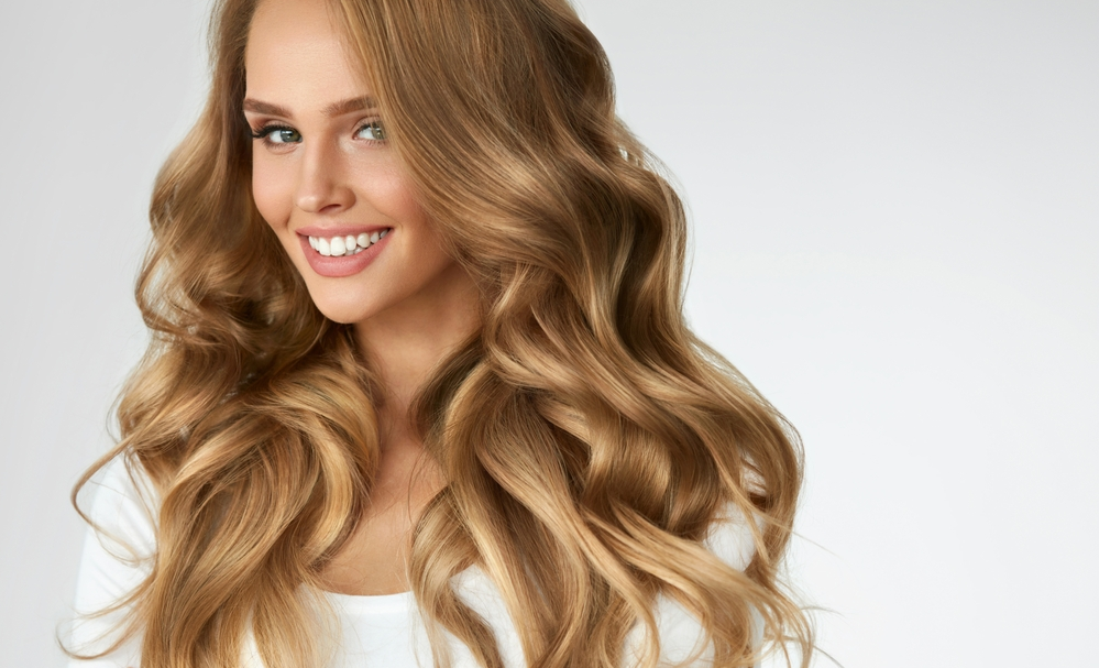 woman long wavy hair smile