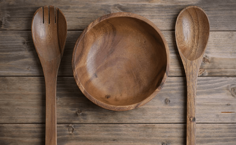 wooden board and kitchen utensils