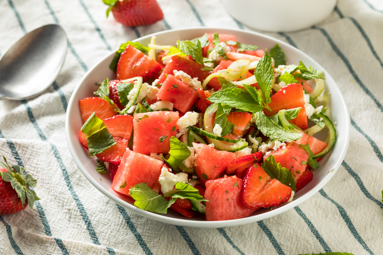 Homemade raw watermelon salad with strawberries feta and mint